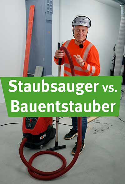 Denny beim Testen eines Bau-Entstaubers.